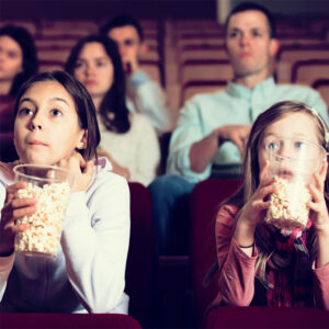 audience-attending-movie-night-with-popcorn-in-cinema-house_thorne-travel